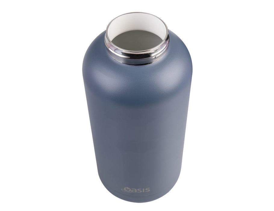Oasis Moda 1.5L Vacuum Bottle - A drink bottle in a matte blue finish with a silver collar and a wide opening, featuring a logo.