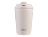 Oasis Ceramic Lined 360ml Insulated Coffee Cup - A drink bottle in a soft beige colour with a lid and a branding logo on the front.