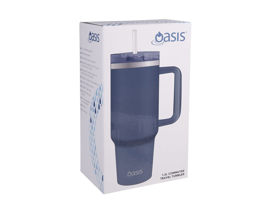 Oasis Commuter 1.2L Vacuum Travel Tumbler - A drink bottle featuring a navy blue design, a handle, and a straw lid, inside a cardboard box with a logo.