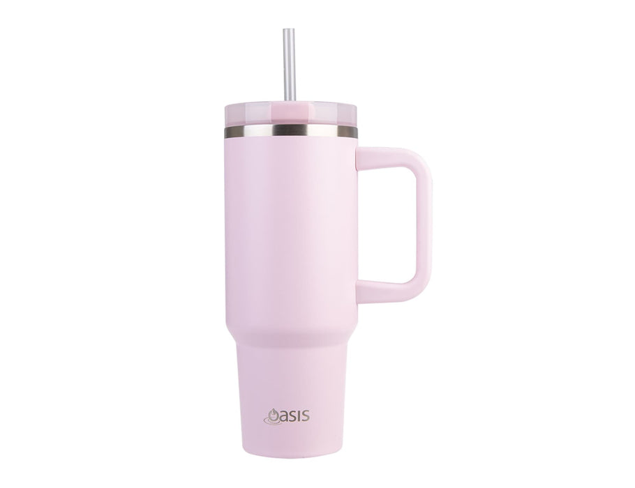 Oasis Commuter 1.2L Vacuum Travel Tumbler - A drink bottle in soft pink with a silver band and a handle, featuring a reusable straw and a branding logo.