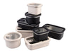Oasis Microwave Safe Rectangular S/S Container 1.1L - Stacked rectangular containers in black and cream, featuring clear lids and a brand logo.