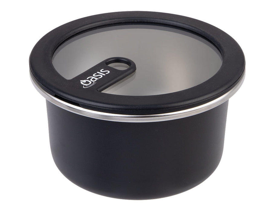 Oasis Microwave Safe Round S/S Container 680ml - A round, black stainless steel container with a clear lid, featuring a logo on the side.