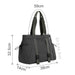 Lightweight Tote Bag With Yoga Mat Straps - A lightweight tote bag in dark grey with adjustable yoga mat straps and multiple pockets. It has a logo on the front.