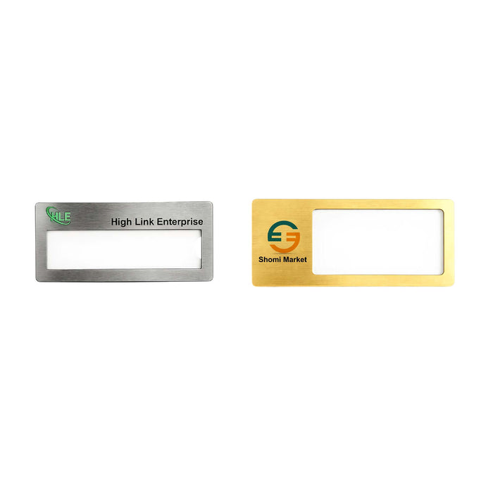 Reusable Metal Name Badge - Two reusable metal name badges in silver and gold finishes, featuring a clear window for name display and logos.