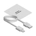 Morgan Bluetooth Speaker - A white charging cable with a USB and micro USB end, accompanied by a user manual.
