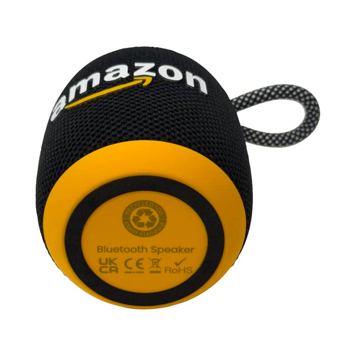 Morgan Bluetooth Speaker - A round black and yellow Bluetooth speaker with a textured surface and a loop for attachment, featuring a logo.