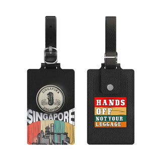 MiTag Duo Tracker Luggage Tag - A black luggage tag featuring a circular emblem and a vibrant design with text, showcasing Singapore's skyline and colours.
