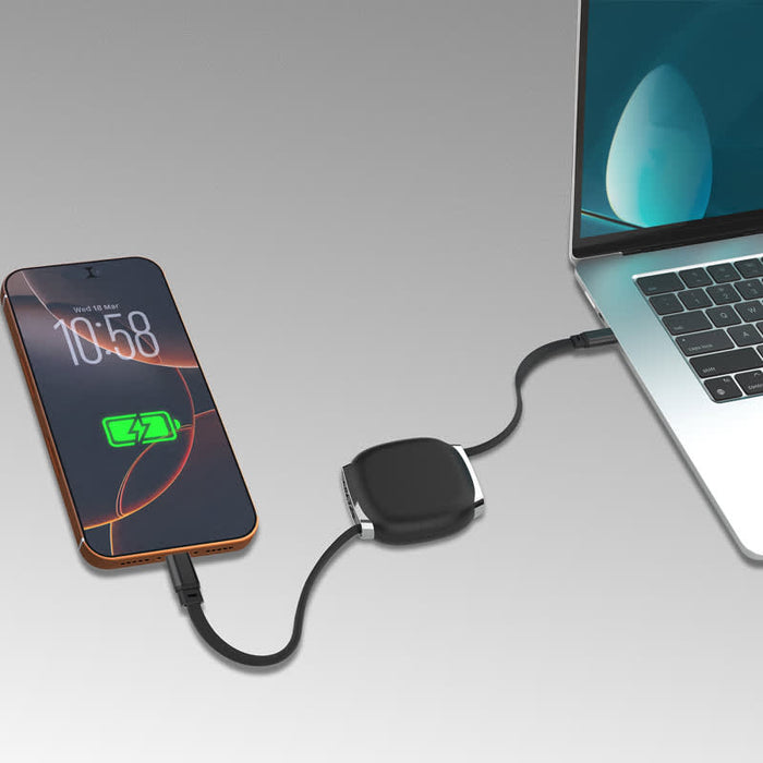 Paulo 100W Retractable Charging Data Cable - A retractable black charging data cable connected to a phone and laptop, with a compact design.