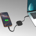 Paulo 100W Retractable Charging Data Cable - A retractable black charging data cable connected to a phone and laptop, with a compact design.