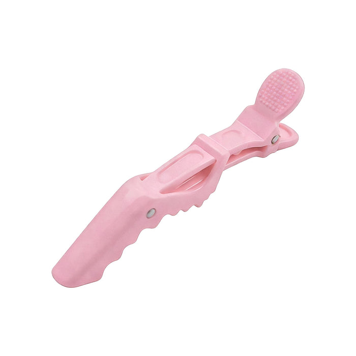 Anti-Slip Positioning Alligator Clip - A pink anti-slip positioning alligator clip with textured grip and an ergonomic design, featuring a logo on one side.