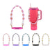 Woven Flower Tumbler Strap - A drink bottle with a pink woven flower tumbler strap, displayed alongside various strap colours.