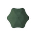 BLUNT Metro Umbrella - A green BLUNT Metro umbrella with a unique octagonal shape and a central button for opening and closing.