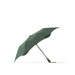 BLUNT Metro Umbrella - A green BLUNT Metro umbrella with a sleek design and a sturdy black handle, featuring a logo.