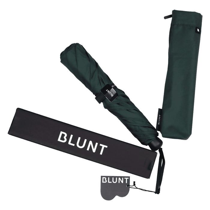 BLUNT Metro Umbrella - A dark green BLUNT Metro Umbrella with a matching sleeve and a storage pouch, featuring a logo.