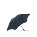 BLUNT Metro Umbrella - A navy BLUNT Metro Umbrella with a unique design and a metallic frame. It features a logo on the handle.