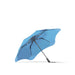 BLUNT Metro Umbrella - A blue BLUNT Metro Umbrella with a sleek design and a sturdy frame. It features a logo on the handle.