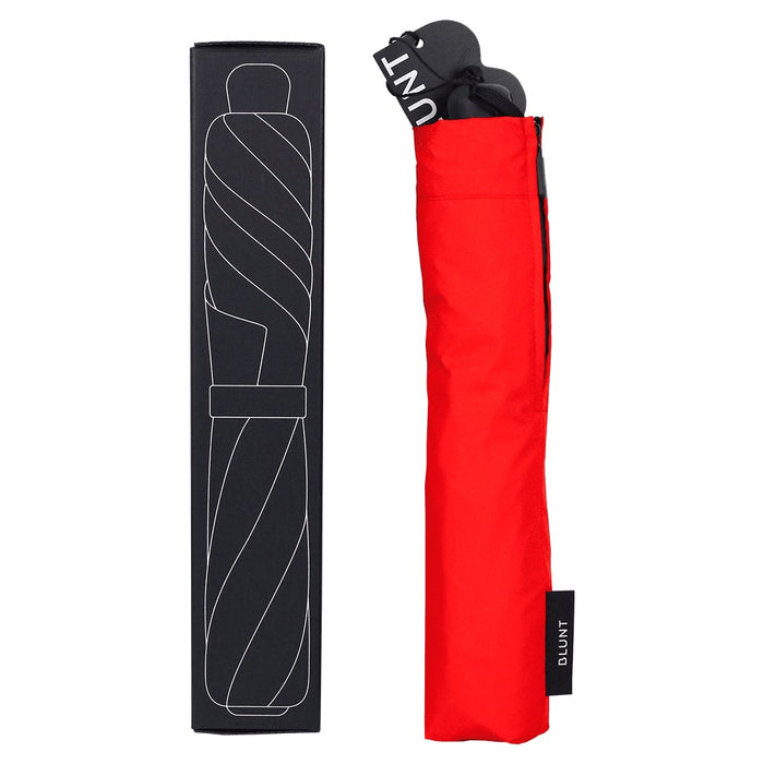 BLUNT Metro Umbrella - A red compact umbrella with a black carrying case, featuring a logo and a slim packaging box.
