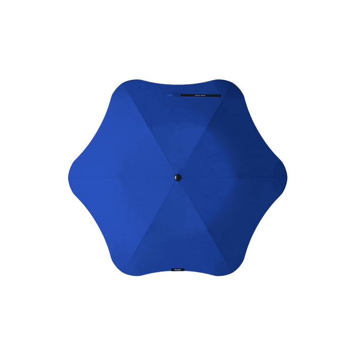 BLUNT Metro Umbrella - A blue BLUNT Metro Umbrella with a unique six-pointed design, featuring a central button.