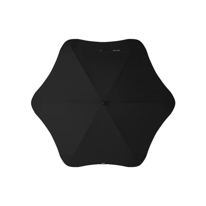 BLUNT Classic Umbrella - A black BLUNT Classic Umbrella with a unique star shape and a central button for opening and closing.