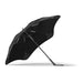 BLUNT Classic Umbrella - A black BLUNT Classic Umbrella with a unique design and a sturdy frame, featuring a logo on the handle.
