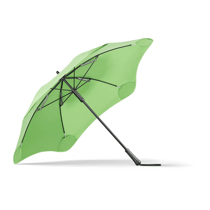 BLUNT Classic Umbrella - A green BLUNT Classic Umbrella with a unique shape and sturdy black frame, featuring a logo.