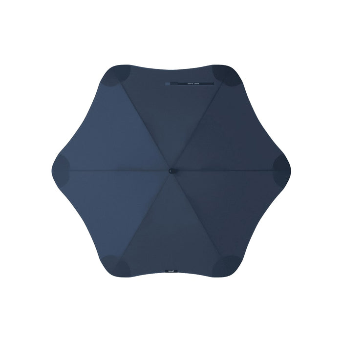 BLUNT Classic Umbrella - A navy blue BLUNT Classic Umbrella with a unique star shape and a central handle. It features a logo on the design.