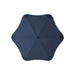 BLUNT Classic Umbrella - A navy blue BLUNT Classic Umbrella with a unique star shape and a central handle. It features a logo on the design.