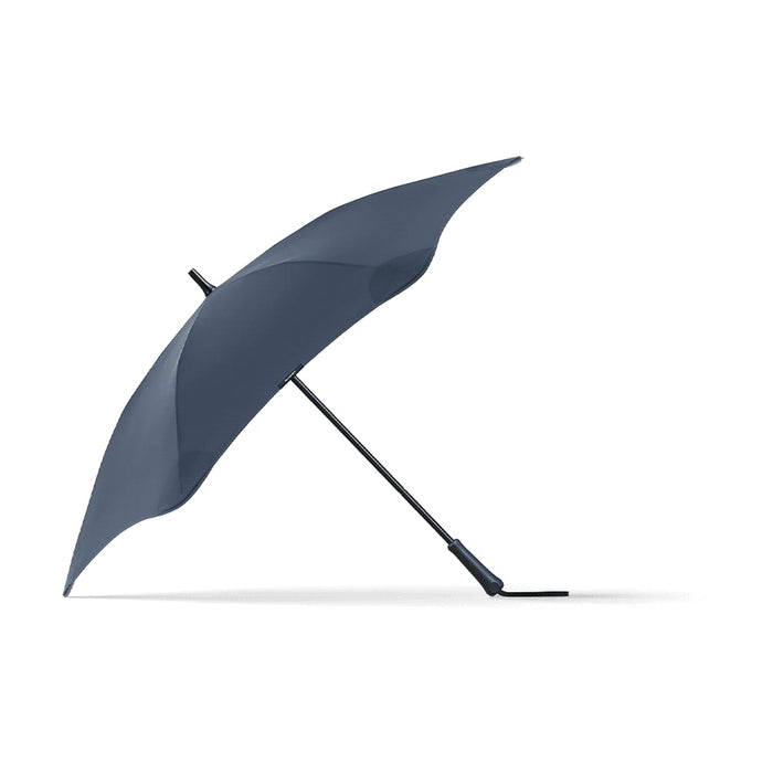 BLUNT Classic Umbrella - A navy umbrella with a curved canopy and a sturdy black handle, featuring a logo on the shaft.