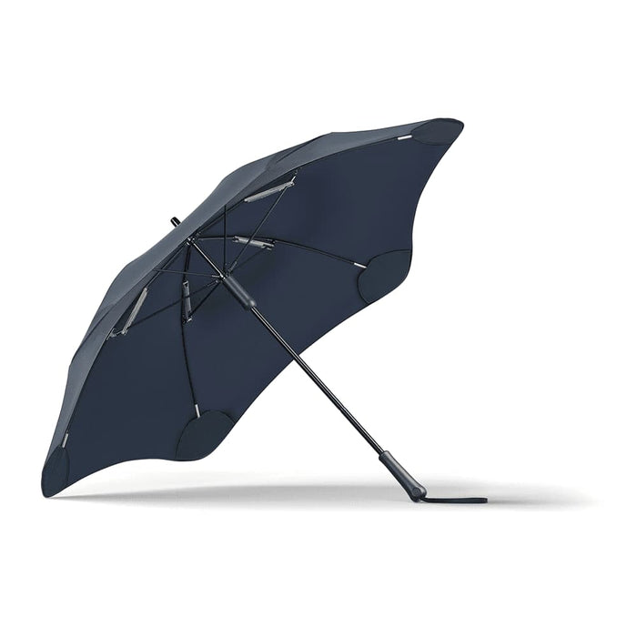 BLUNT Classic Umbrella - A navy blue BLUNT Classic Umbrella with a unique canopy shape, featuring a sturdy black frame and a logo.
