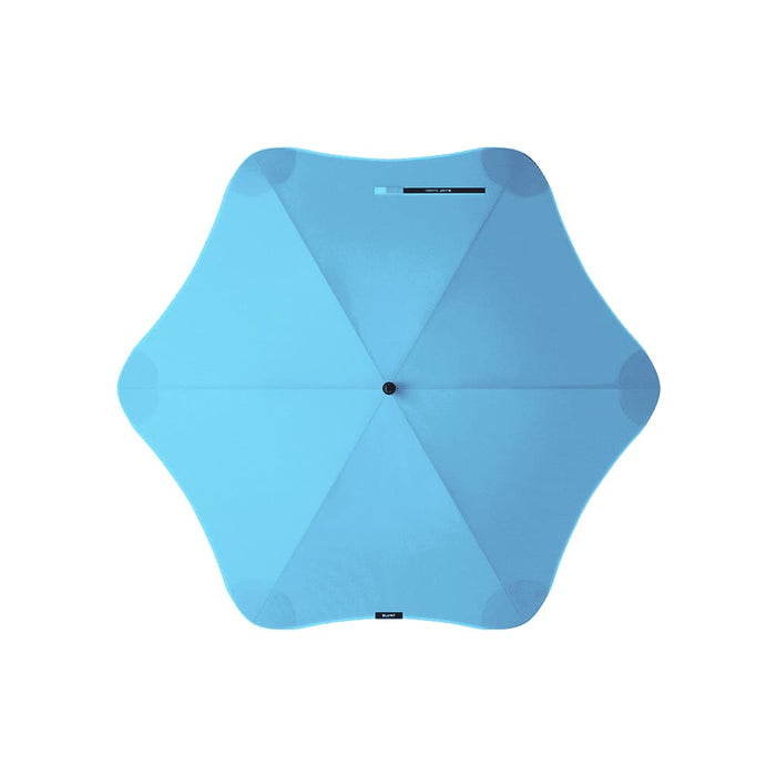 BLUNT Classic Umbrella - A light blue umbrella with a star-shaped design and a central hub. It features a logo on the top.