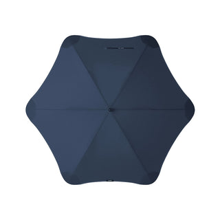 BLUNT Exec Umbrella - A dark navy umbrella with a sleek design and central button, featuring a branding logo.
