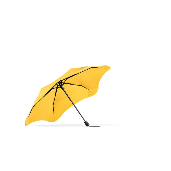 BLUNT Neo Umbrella - A yellow umbrella with a black frame, featuring a unique, modern design and a sturdy structure.