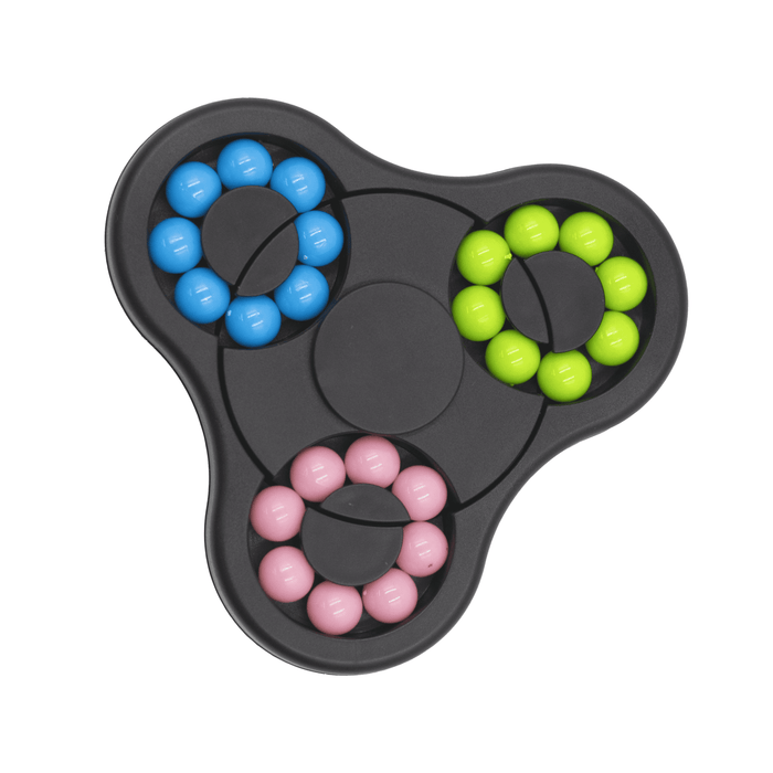 The Spin Buddy Puzzle Game - A tri-coloured puzzle game in black, featuring blue, green, pink, and violet spheres arranged in circular patterns.