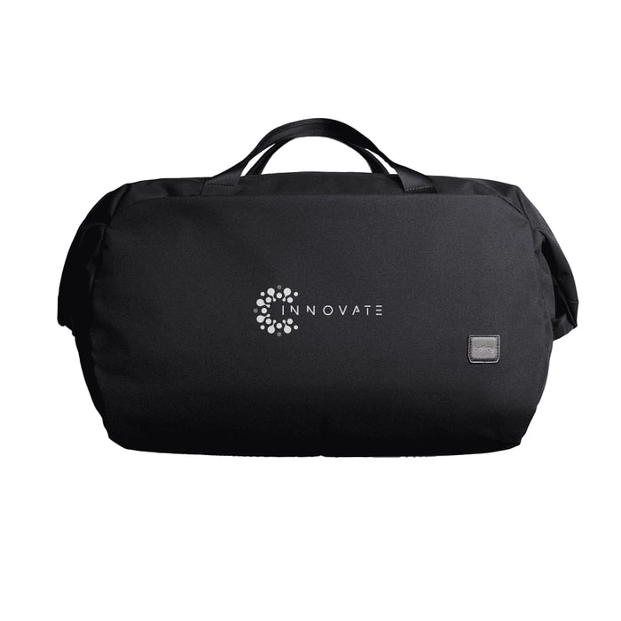 Bellroy Classic Duffel 45L - A black duffel bag with a logo on the front. It features dual handles for carrying.