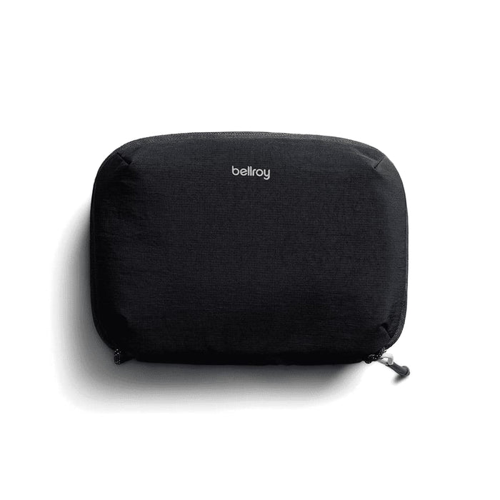 Bellroy Lite Tech Kit - A black tech kit with a zip closure and a logo on the front, featuring a sleek, minimalist design.