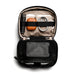 Bellroy Lite Tech Kit - A black tech kit opened to reveal a drink bottle, orange case, cords, and a mesh pocket.