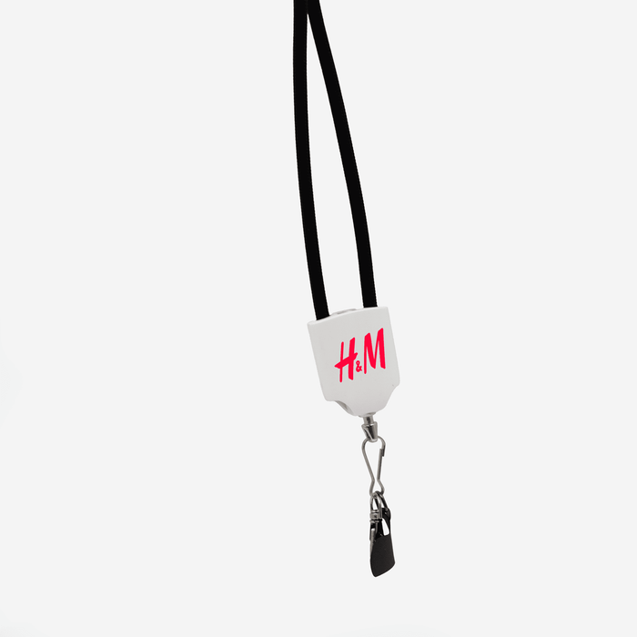 The Power Band Charging Lanyard - 60W - A black lanyard features a white attachment with a branding logo and a clip at the end.