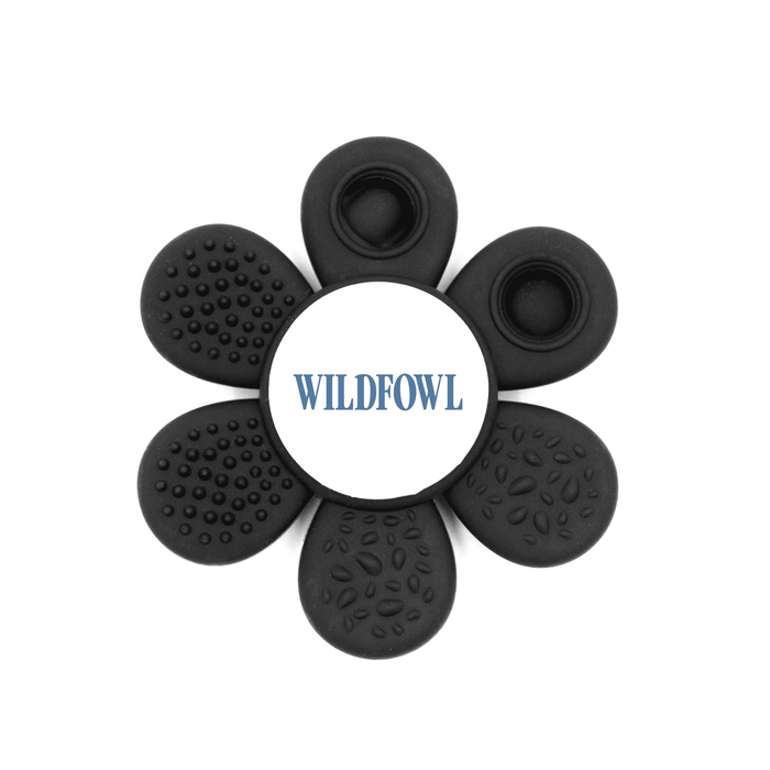 The Spinzy - A black flower-shaped product with textured petals and a central logo. It features various raised patterns on each petal.