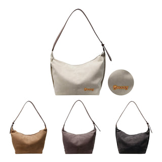 Dumpling Canvas Tote Bag - A canvas tote bag in cream, brown, grey, and black, featuring a logo. It has a shoulder strap for easy carrying.