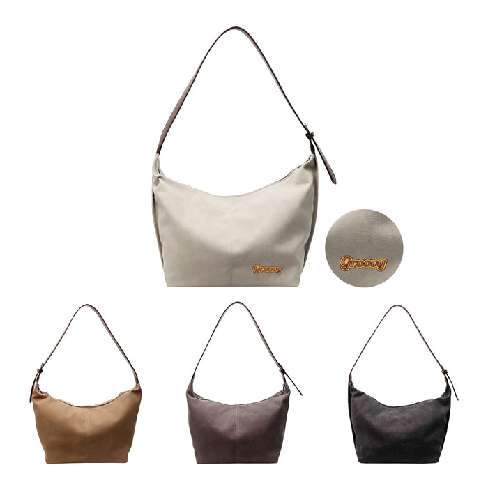 Dumpling Canvas Tote Bag - A canvas tote bag in cream, brown, grey, and black, featuring a logo. It has a shoulder strap for easy carrying.