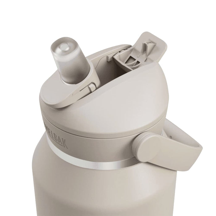 CamelBak - Thrive Flip Straw VSS 1.2L - A drink bottle in beige with a flip straw lid and a side handle, featuring a logo.
