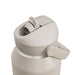 CamelBak - Thrive Flip Straw VSS 1.2L - A drink bottle in a light beige colour with a flip straw lid and a side handle. It features a logo on the side.