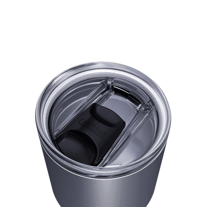 CamelBak - Thrive Tumbler VSS 0.9L - A drink bottle with a silver finish features a transparent lid and a black sliding cover, along with a logo.