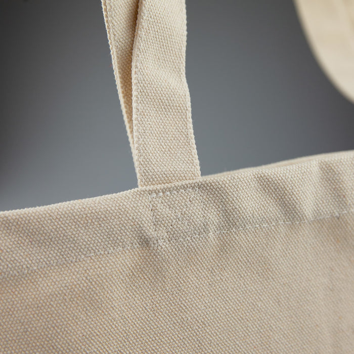 440gsm Kensington Recycled Cotton Tote Bag - A light beige recycled cotton tote bag featuring sturdy shoulder straps and a simple design, with a branding logo.