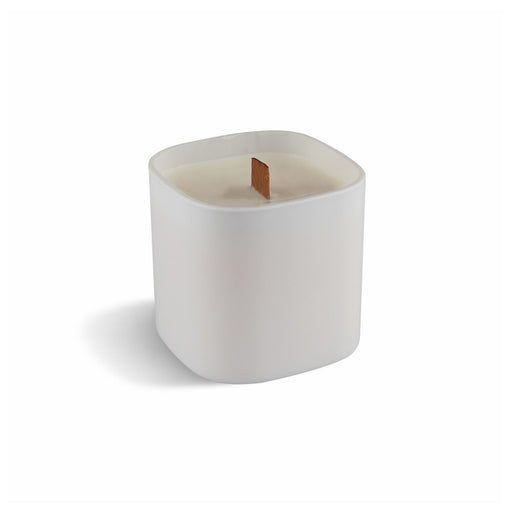 Premium Square Glass Candle - A premium square glass candle in white, featuring a wood wick. It has a smooth, minimalist design and a logo.