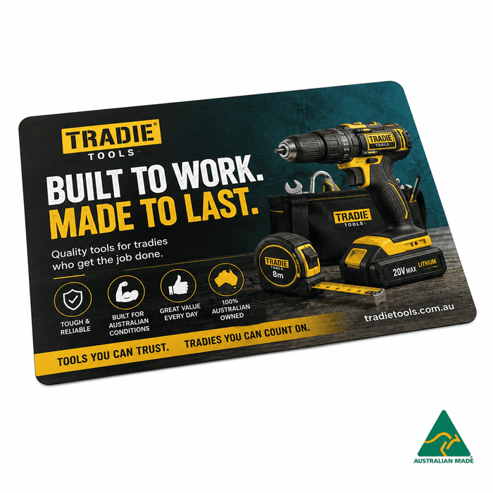 Deluxe Counter Mat A4 (297mm x 210mm) 1mm Natural Rubber - A promotional mouse mat featuring a black and yellow power drill, with a logo and various tool images on a textured background.
