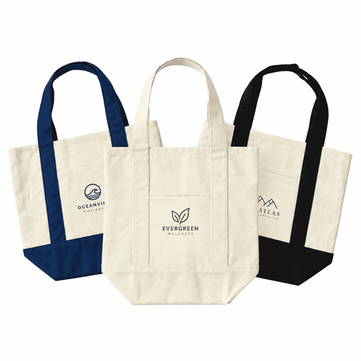 Mini Canvas Tote - Three mini canvas tote bags in natural, navy blue, and black with various logos on the front.