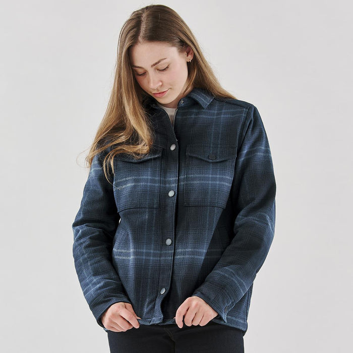 Women's Highland Sherpa Lined Plaid Jacket - A women's plaid jacket in navy with a sherpa lining and button front, featuring two chest pockets.