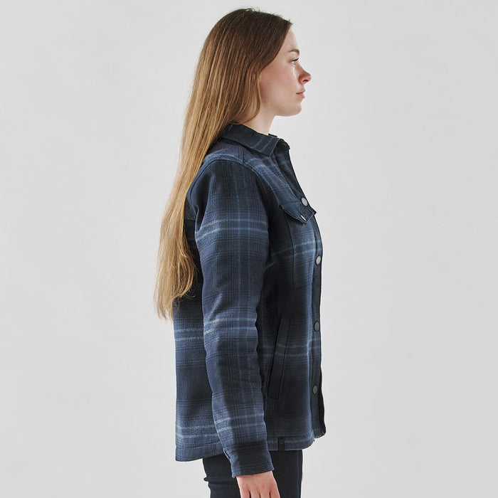 Women's Highland Sherpa Lined Plaid Jacket - A side view of a women's plaid jacket in navy and grey, featuring a buttoned front and a branded logo.