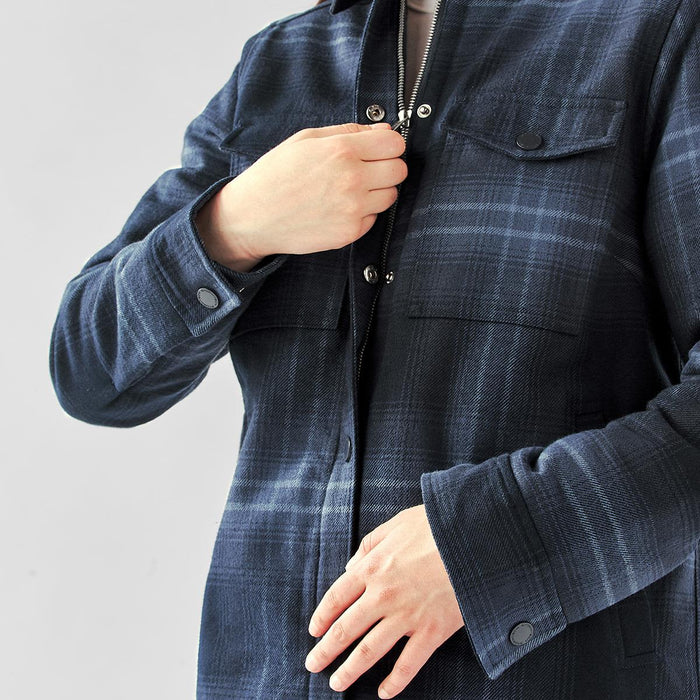 Women's Highland Sherpa Lined Plaid Jacket - A navy and grey plaid jacket with a Sherpa lining, featuring snap closures and two chest pockets.
